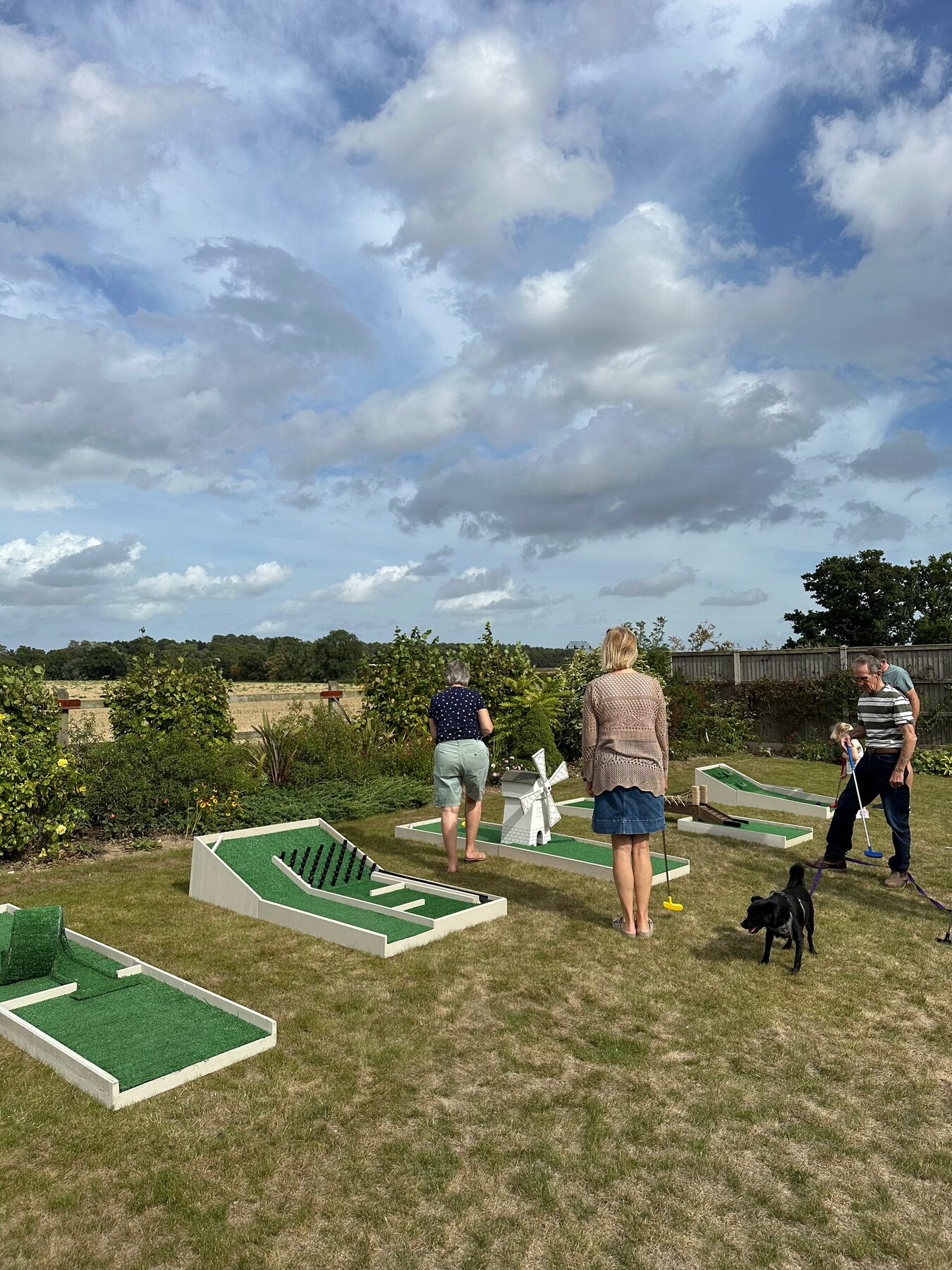 Family playing in a garden